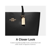 Coach Women's Town Tote – Polished Pebble Leather Spacious Handbag, Snap Closure, Iconic Everyday Tote
