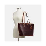 Coach Taxi Tote in Signature Canvas – Black Currant Sable | Elegant Everyday Work Tote with Laptop Compartment