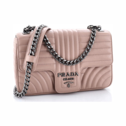 Pre-Loved Prada Diagramme Quilted Leather Medium Chain Flap Shoulder Bag – Pink