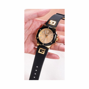 GUESS Ladies 38mm Two-Tone Watch | Black Silicone Strap & Champagne Dial